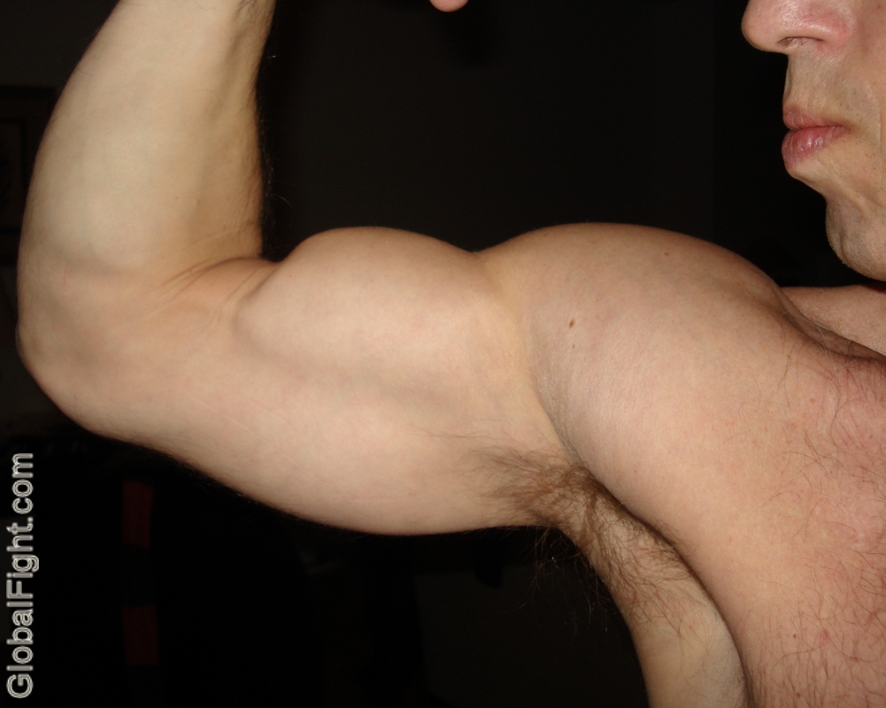 biceps big peak flexing closeup video tape shoots
