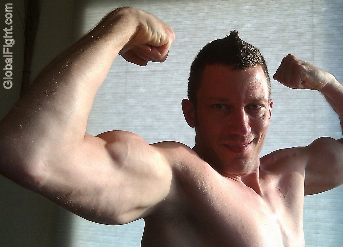 biceps dude flexing peaks hotel wrestling match