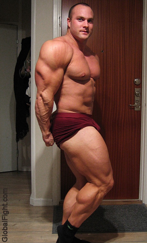 bodybuilder wrestler stud flexing huge calves