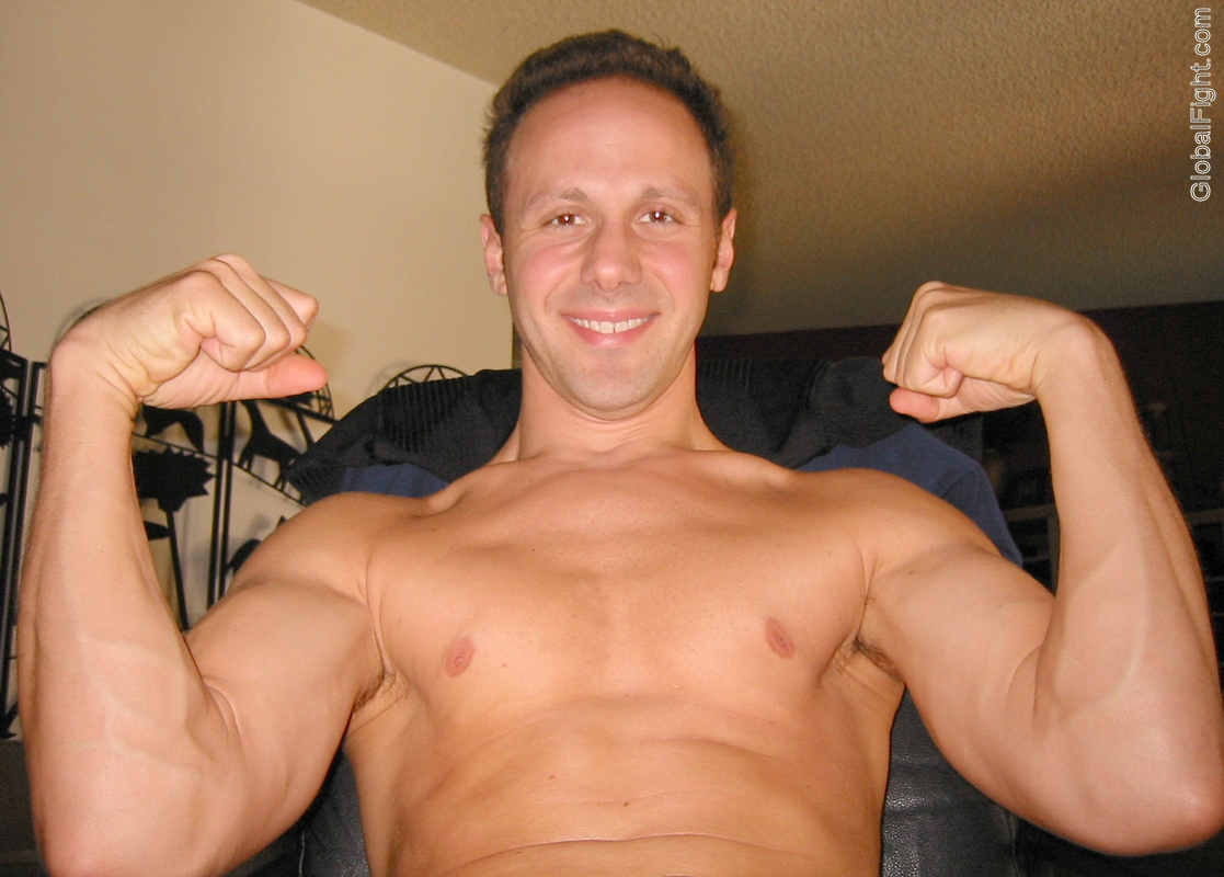 double biceps pose muscle jock flexing on camera