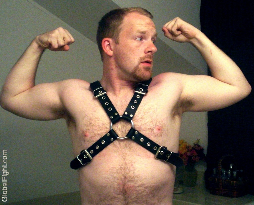 gay goatee man leather harness submissive slave