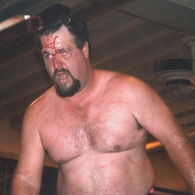 hairychest daddy bear bloody face pro wrestling match 