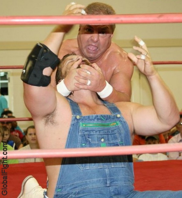 man overalls coveralls wrestling shirtless