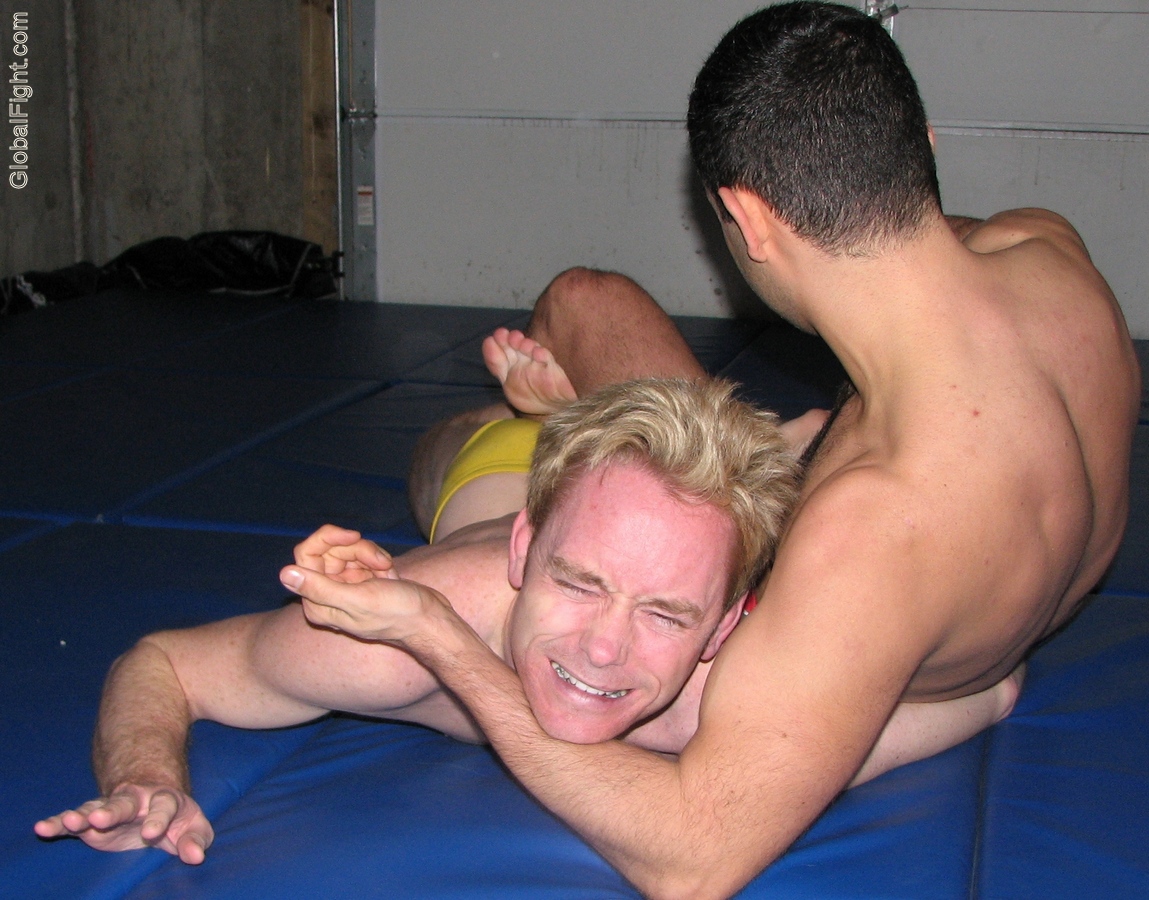 mat men wrestling photographs grimacing man