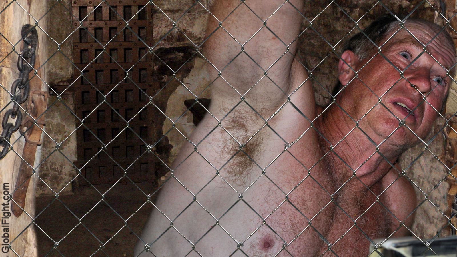 white slave man captured bondage nude cage match