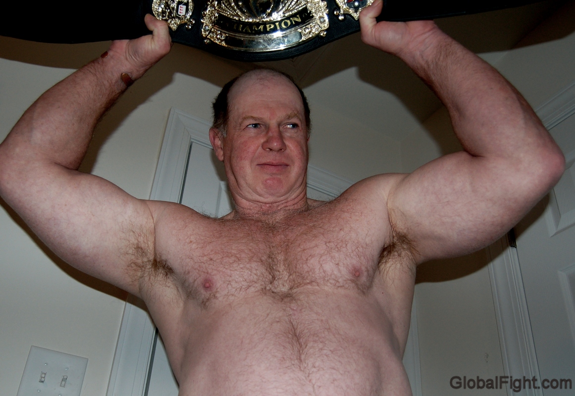 wrestling champion beefy man stripping naked